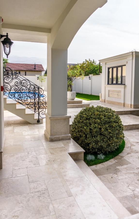 Grant Boutique Hotel Arad Exterior foto A garden in the city